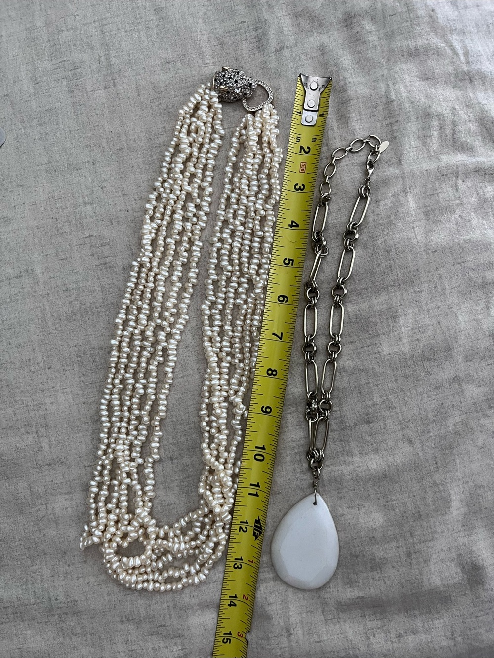 Multi-Strand Faux Pearl Necklace with Animal Clasp & Chunky White Stone & Chain.